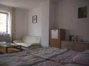 Schlafzimmer mit Wohnecke